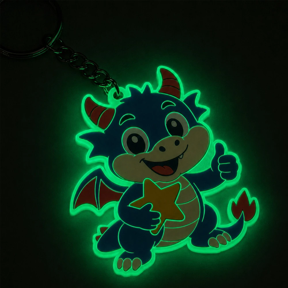 Glow-in-the-dark soft PVC dragon keychain glowing green in the dark