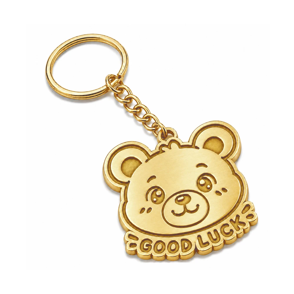 Custom zinc metal keychain in gold plating with engraved bear good luck design